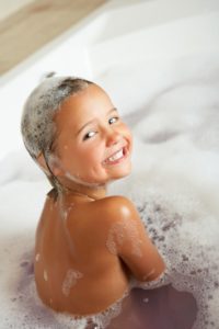 kid in bath - Plumbing, sewer, & drain services in Peoria IL