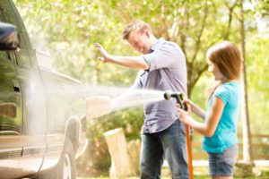 father & daughter washing truck - Plumbing, sewer, & drain services in Peoria IL