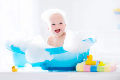 baby in bathtub - Plumbing, sewer, & drain services in Peoria IL