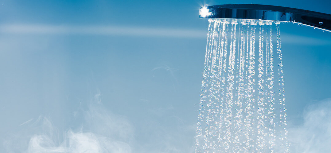 Shower with flowing water and steam