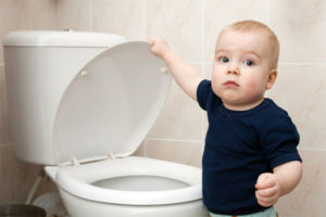 Little Boy Looks in the Toilet — Peoria, IL — Arnold & Sons Plumbing Sewer & Drain Services