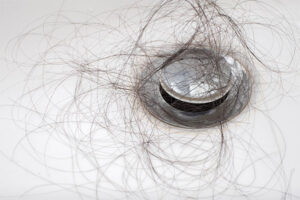 Hair in the Bathtub Drain — Arnold & Sons Plumbing Sewer & Drain Services